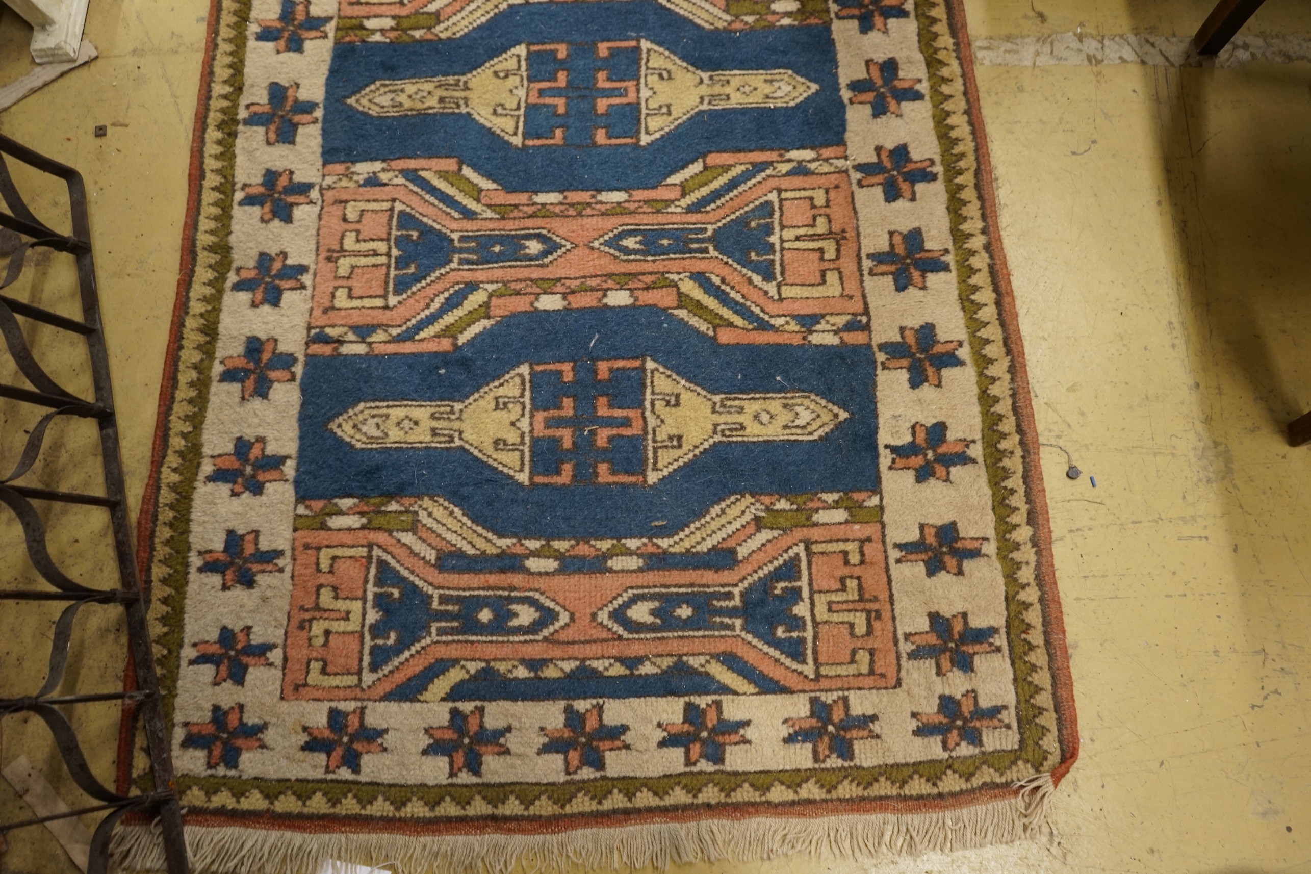 A Caucasian style blue ground runner, 264 x 90cm